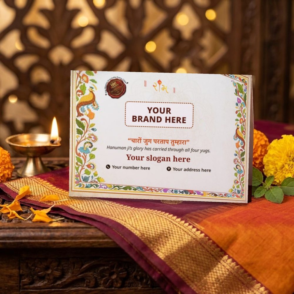 A big A4 book standing on puja silk beside a small diya, its back cover showing space for your brand